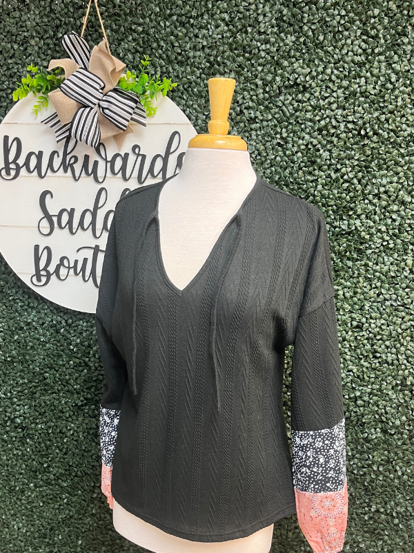 Black textured blouse with sleeve detail