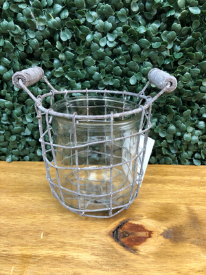 Metal wire basket with glass jar