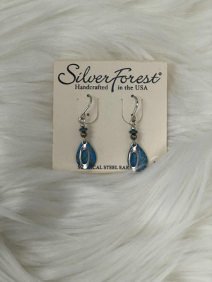 Apprx 1" dangle silver earrings with blue tear drop